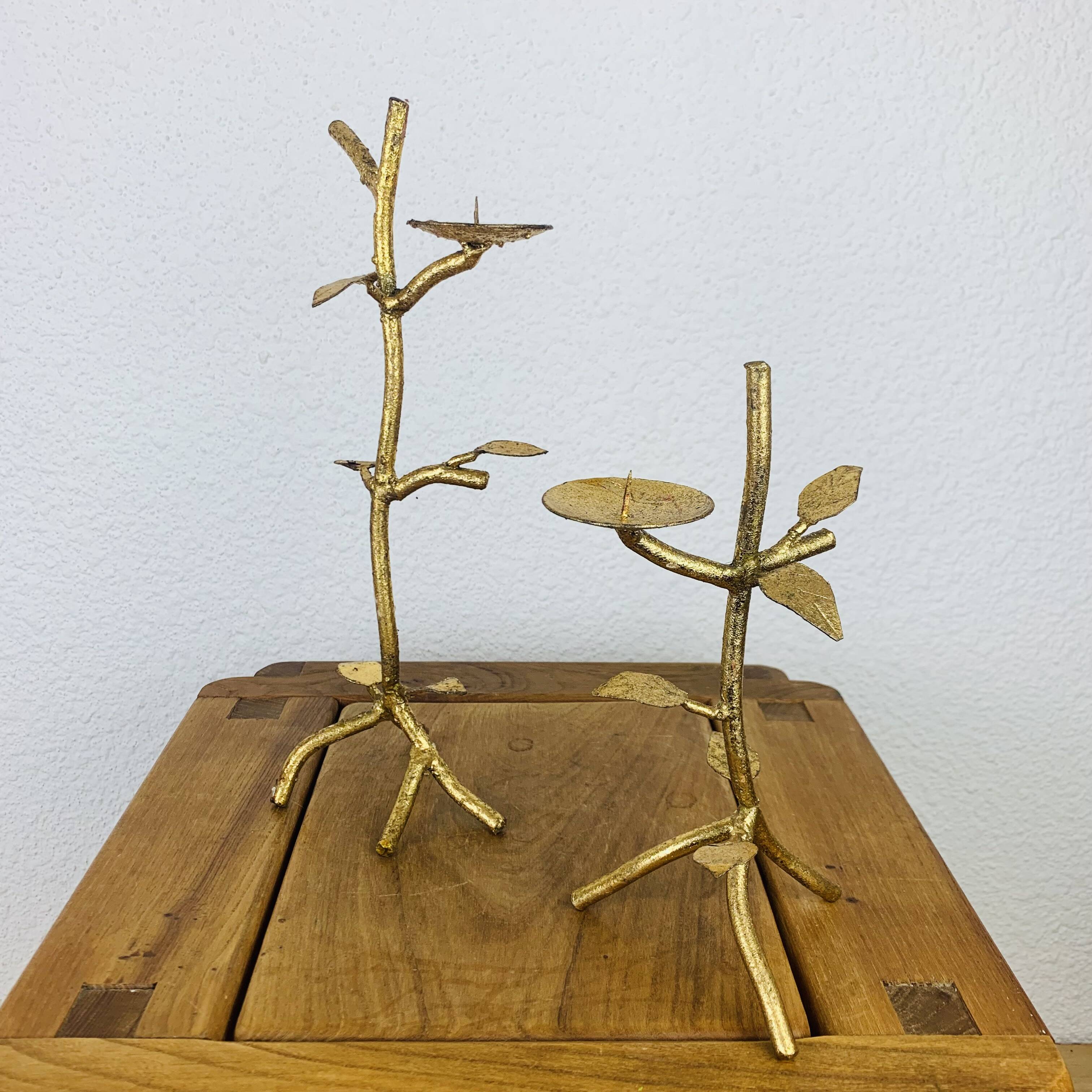 Pair of golden foliage candlesticks