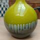 Green ceramic vase with stamp