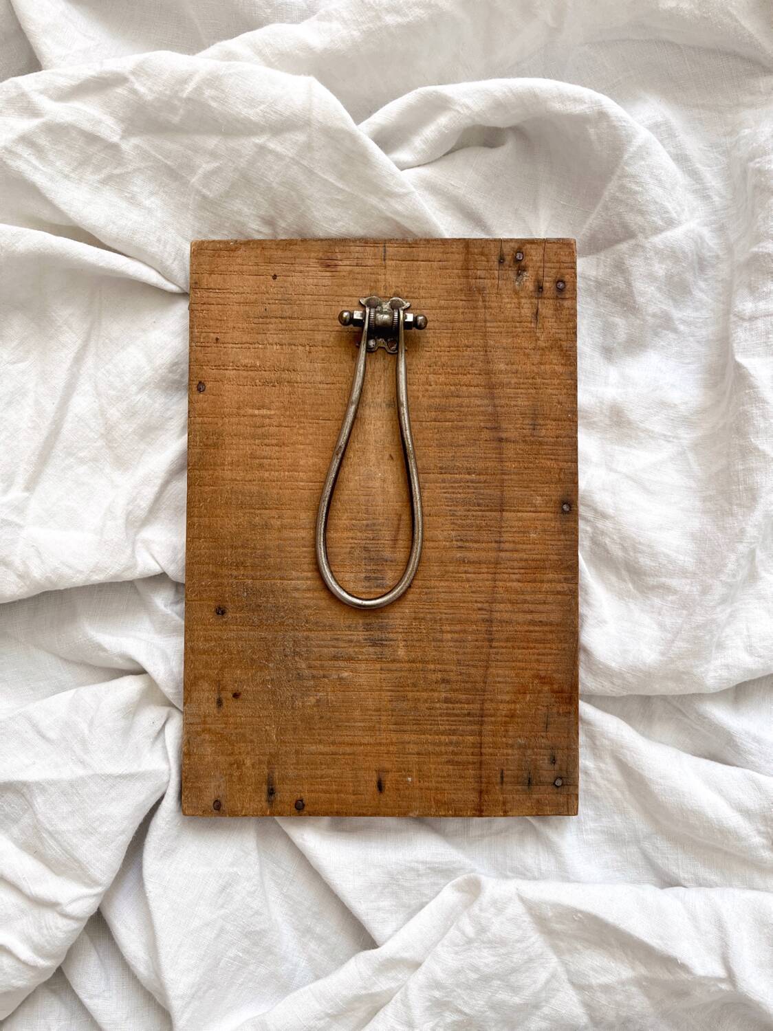 Antique mercury glass barber mirror and carved wooden frame