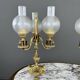 Pair of three-light candelabra in bronze, 20th century