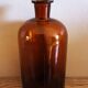 Vase en verre ambré flacon vintage