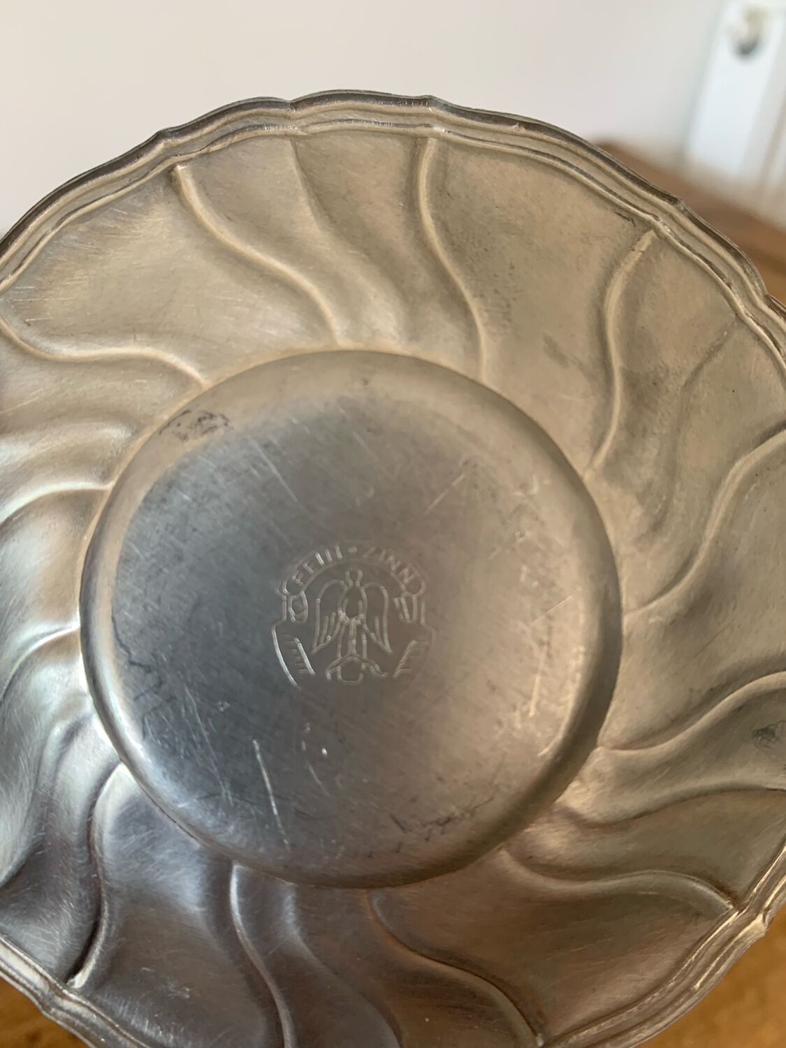 2 small porcelain cups and their pewter cup holders