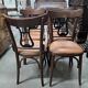 Set of 6 vintage curved wooden chairs, adorned with an elegant black lyre-shaped backrest.