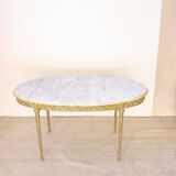 Oval coffee table in marble and brass