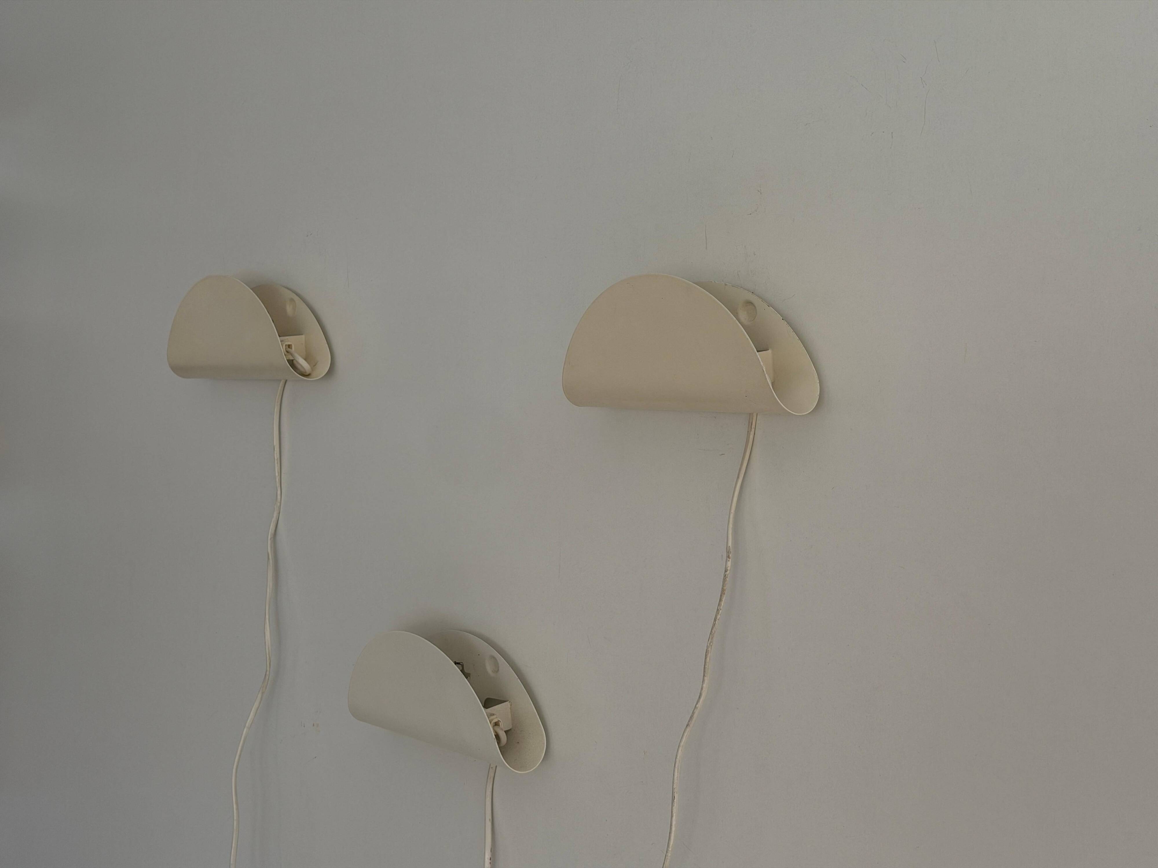 Set of three cream metal wall lights by Nordlux, 1980s, Sweden.