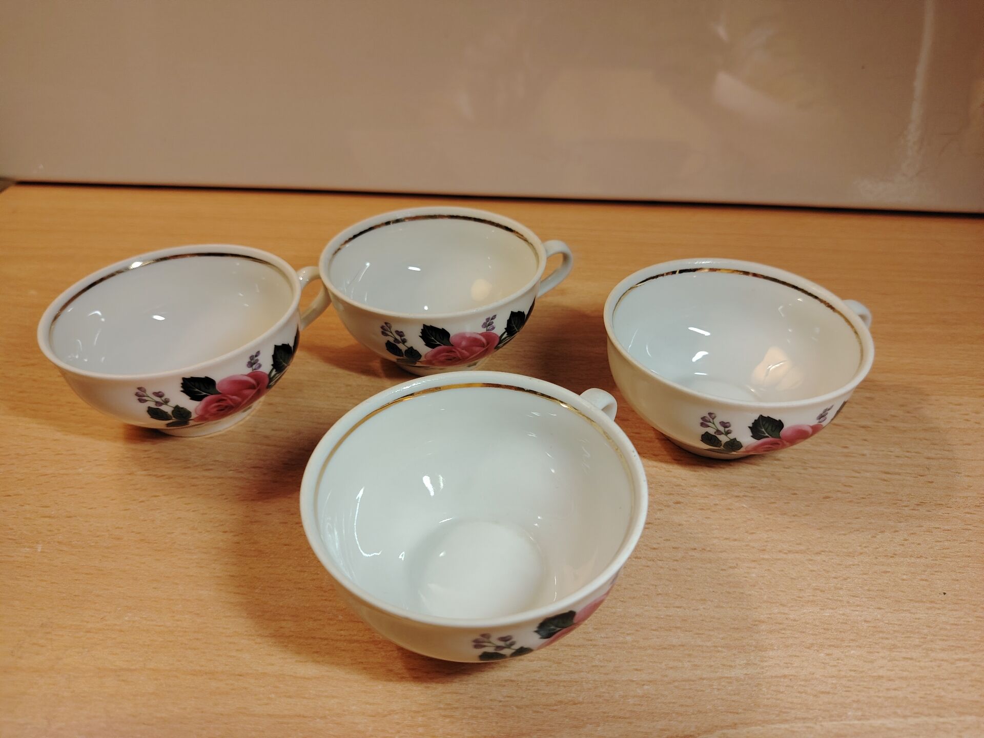 Set of 4 antique porcelain cups with rose pattern CNP France