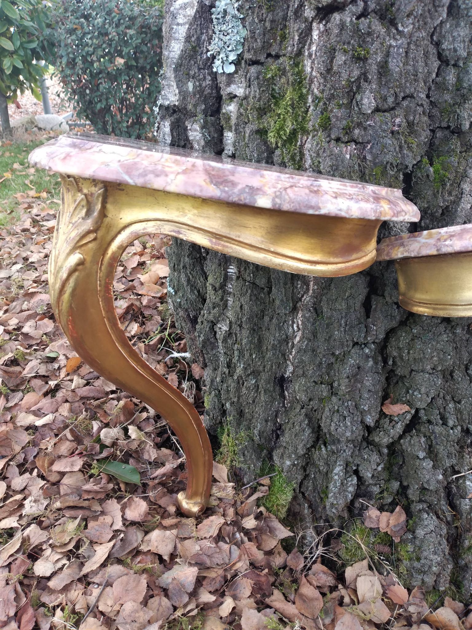 Louis XV style giltwood and marble wall consoles