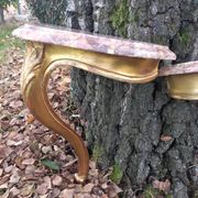 Louis XV style giltwood and marble wall consoles
