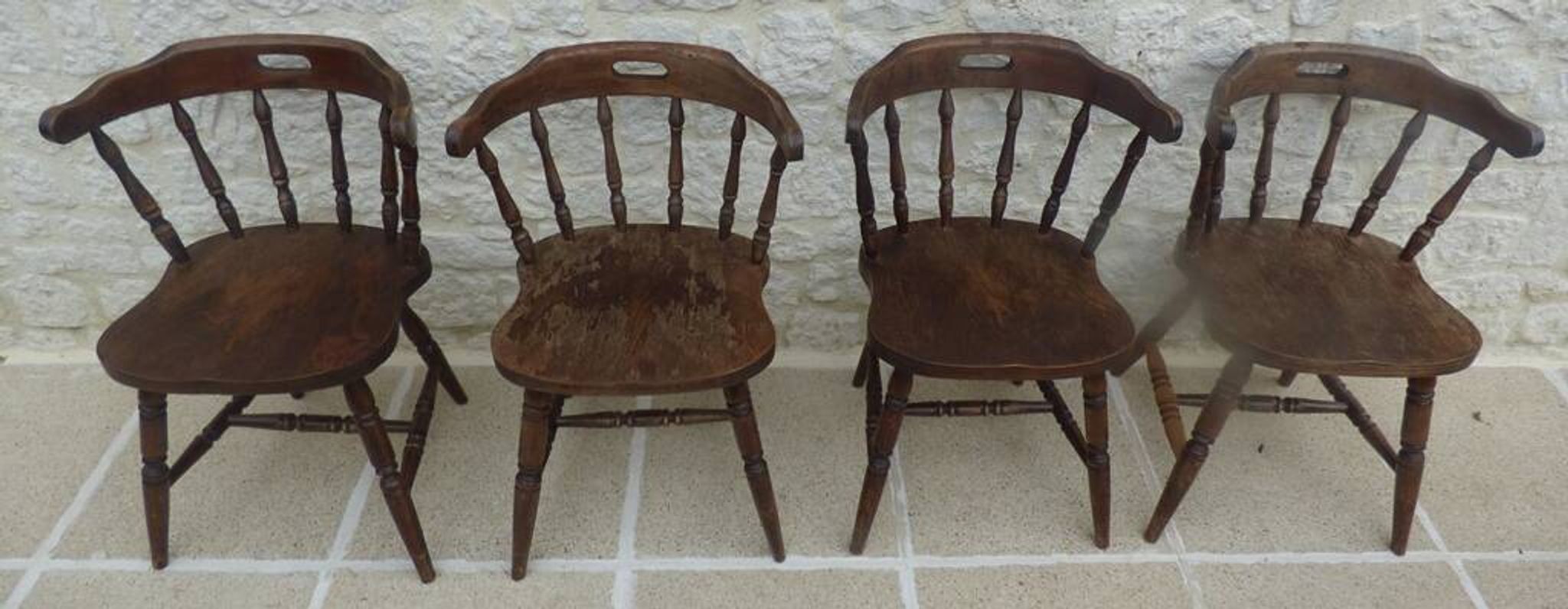 4 solid wood chairs in western style called "smockers chairs", in oak.