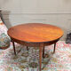 Dining table with a mahogany band in louis xvi style