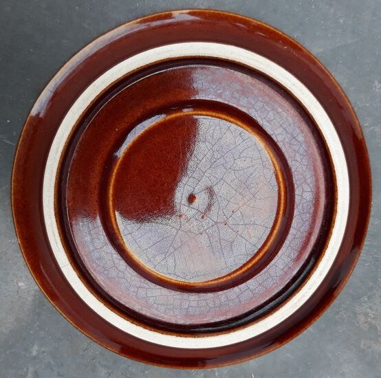 Old cups and under cups of coffee - brown ceramics typical of station buffets