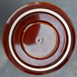 Old cups and under cups of coffee - brown ceramics typical of station buffets