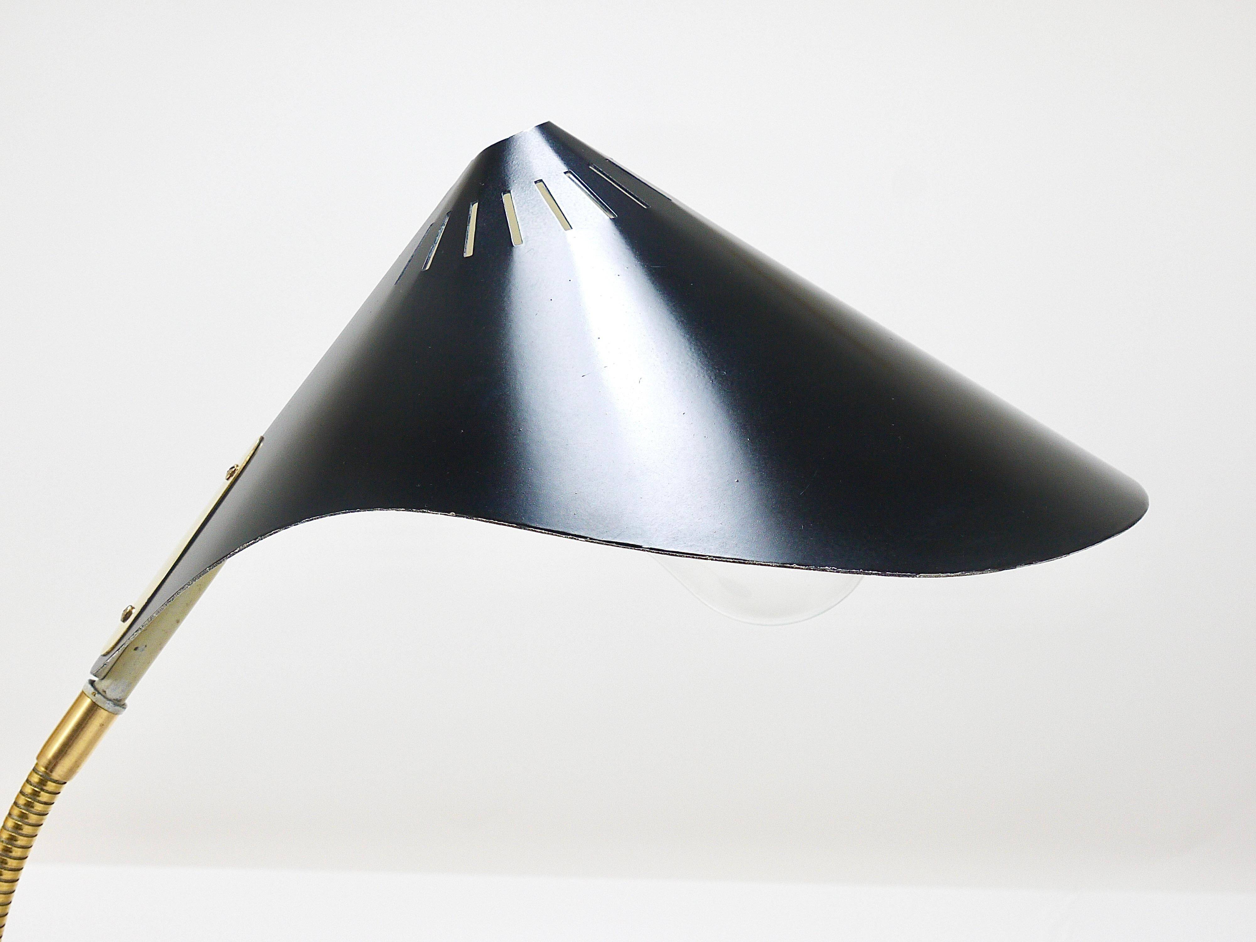 1950s Cosack Cobra black desk or table lamp in brass, mid-century, Stilnovo style.