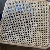 Plia chairs by Castelli in wood and cane.