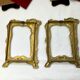 Pair of brass frames with Art Nouveau style woman