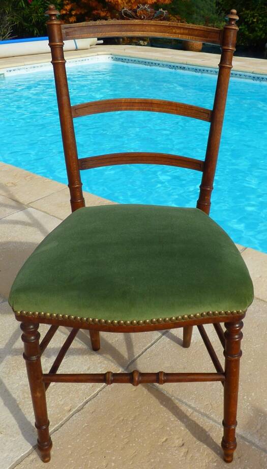 1 solid wood chair with green velvet top and nails