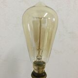 Old lamp with brass foot