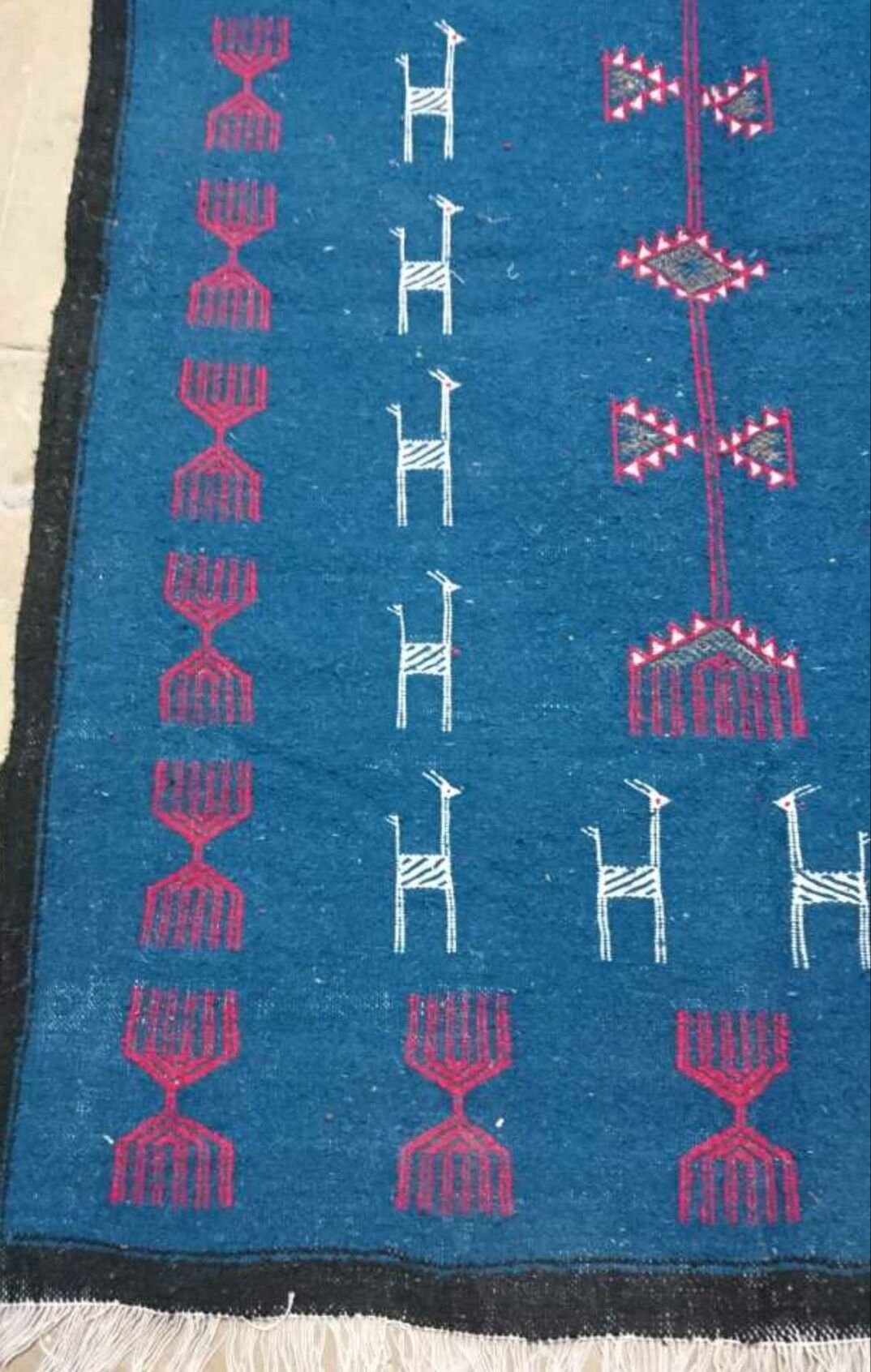 Tapis bleu en laine 195x110cm