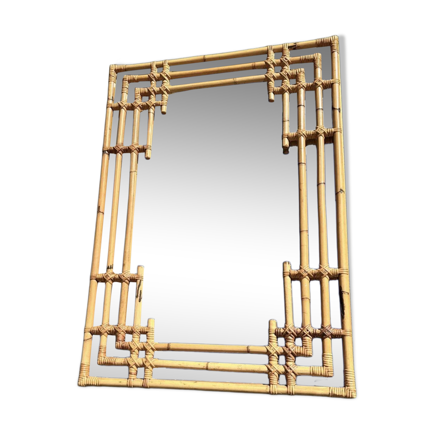 Large sculptural mirror handmade from natural bamboo and woven rattan, 1960.