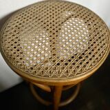 Curved wooden stool and cannage