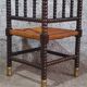 Fireplace corner chair in Louis XIII style, turned wood with braided rush, 19th century.