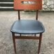 Scandinavian chair sitting in leatherette