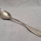 Solid silver spoon, neck brace