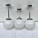 Glass and aluminum globe hanging lamp