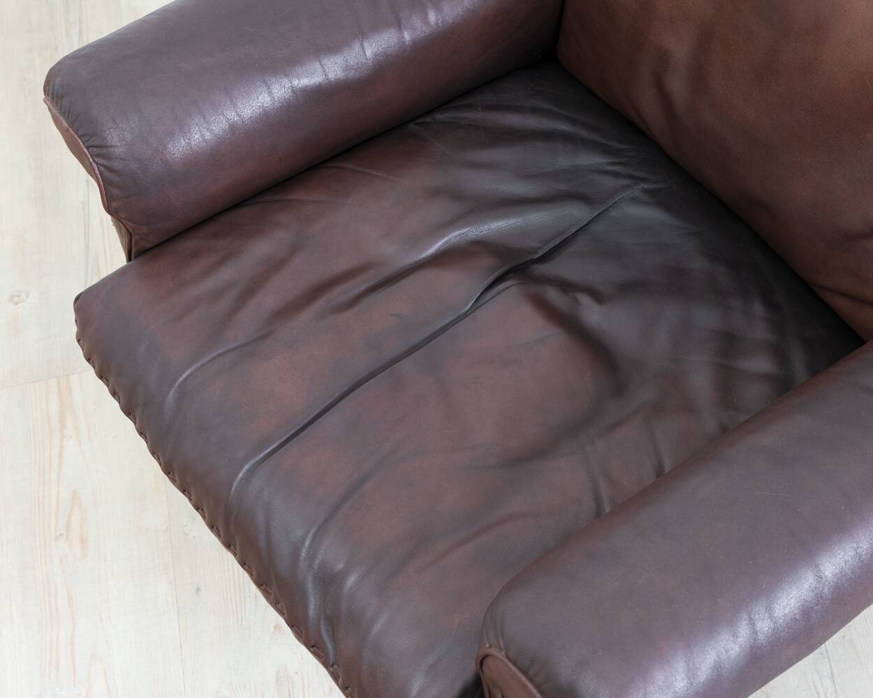 Brown leather swivel armchair by De Sede, model DS 31, 1960s, wine.