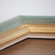 Frame in gilded and green wood