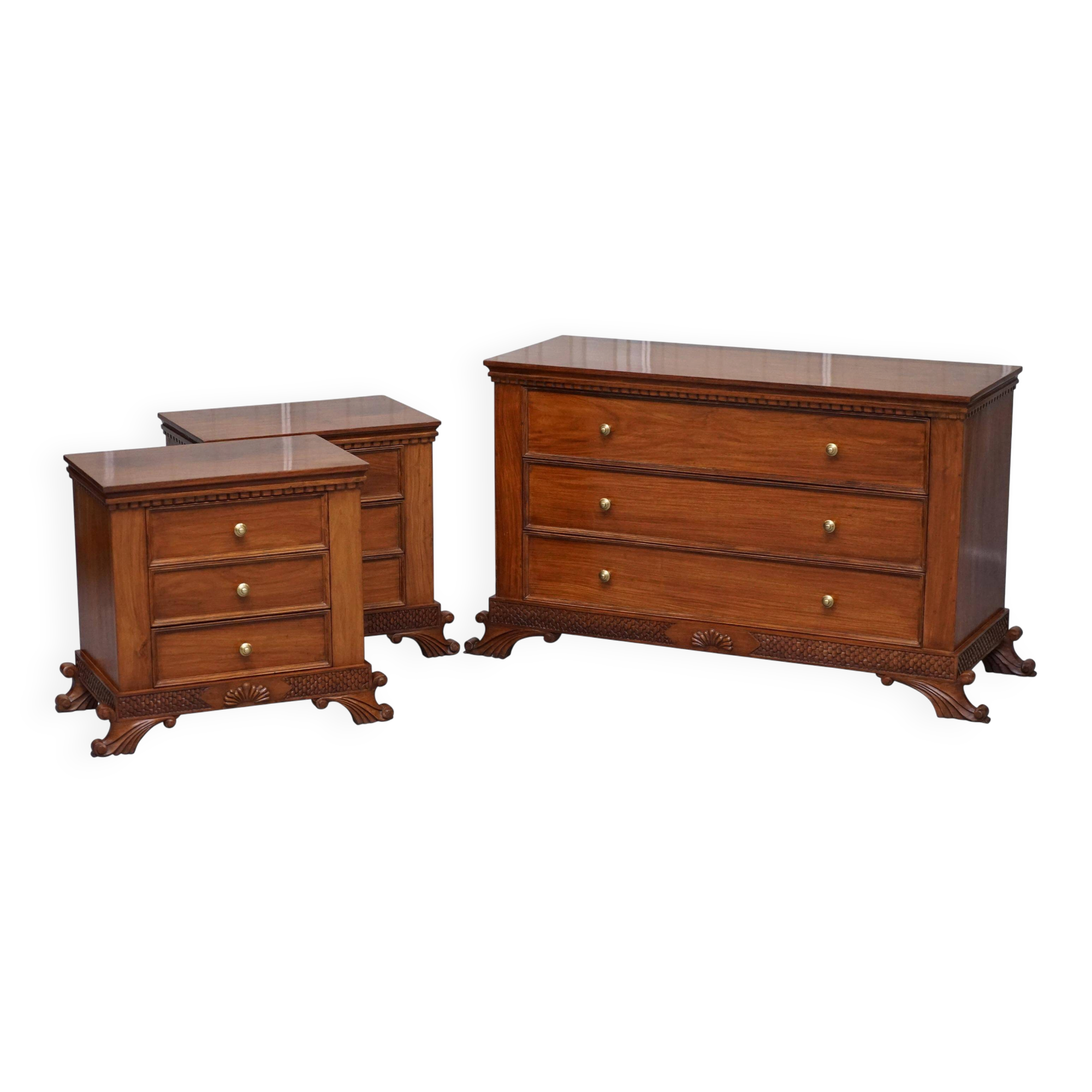 Set of hardwood dressers with finely carved bases.