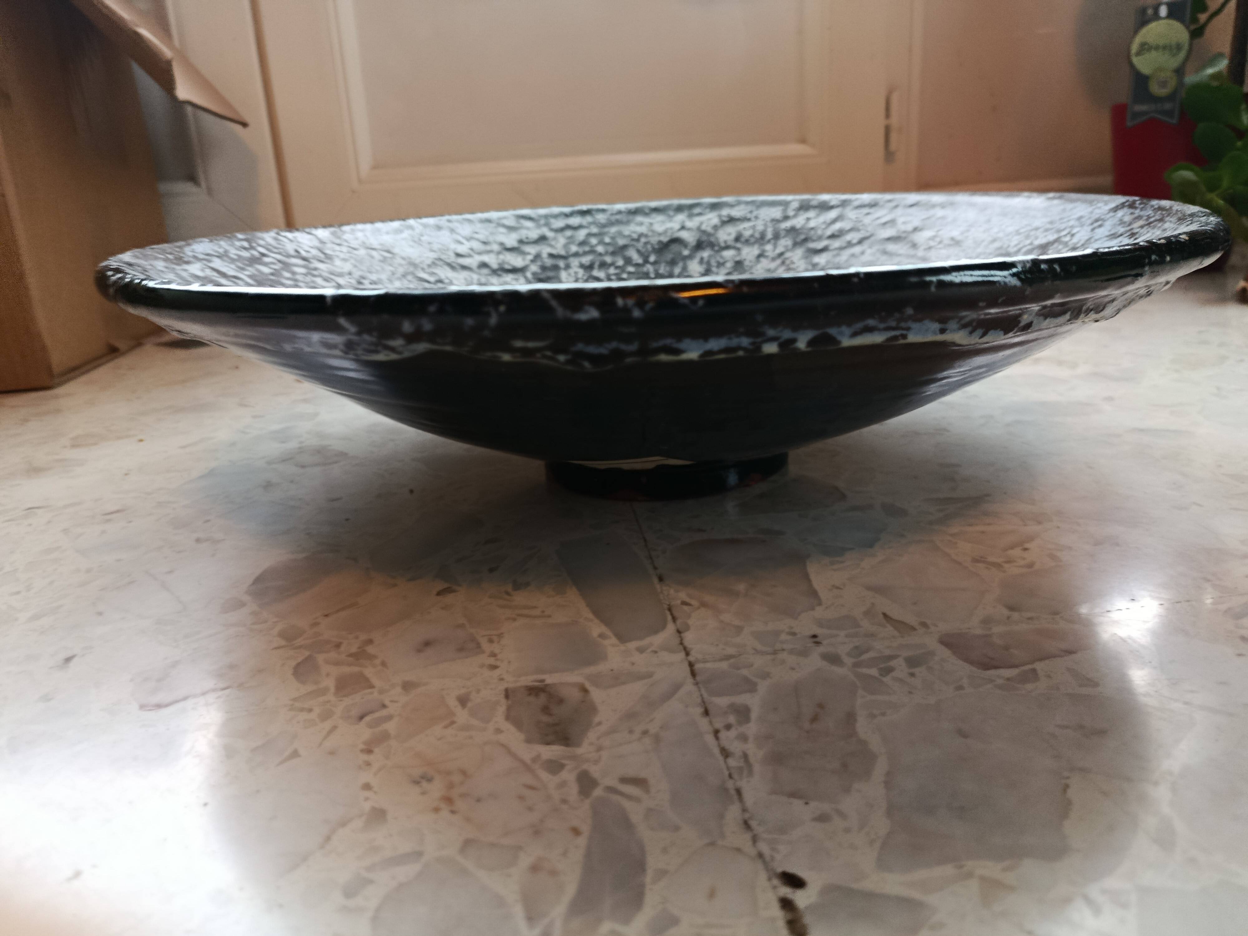 Large stoneware platter signed c. pitot, mid-20th century, black, white, and red glazed ceramic