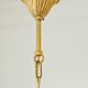 Small vintage brass chandelier with amber crystal pendants.