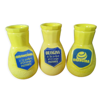 Trio of orangina straw holder