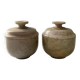 2 small stone urns