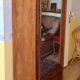 Armoire bonnetière avec miroir une porte 1930