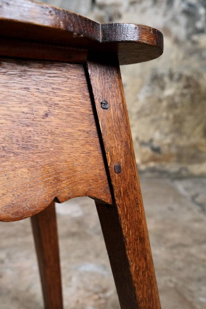Pair of scalloped oak stools, France, early 20th century