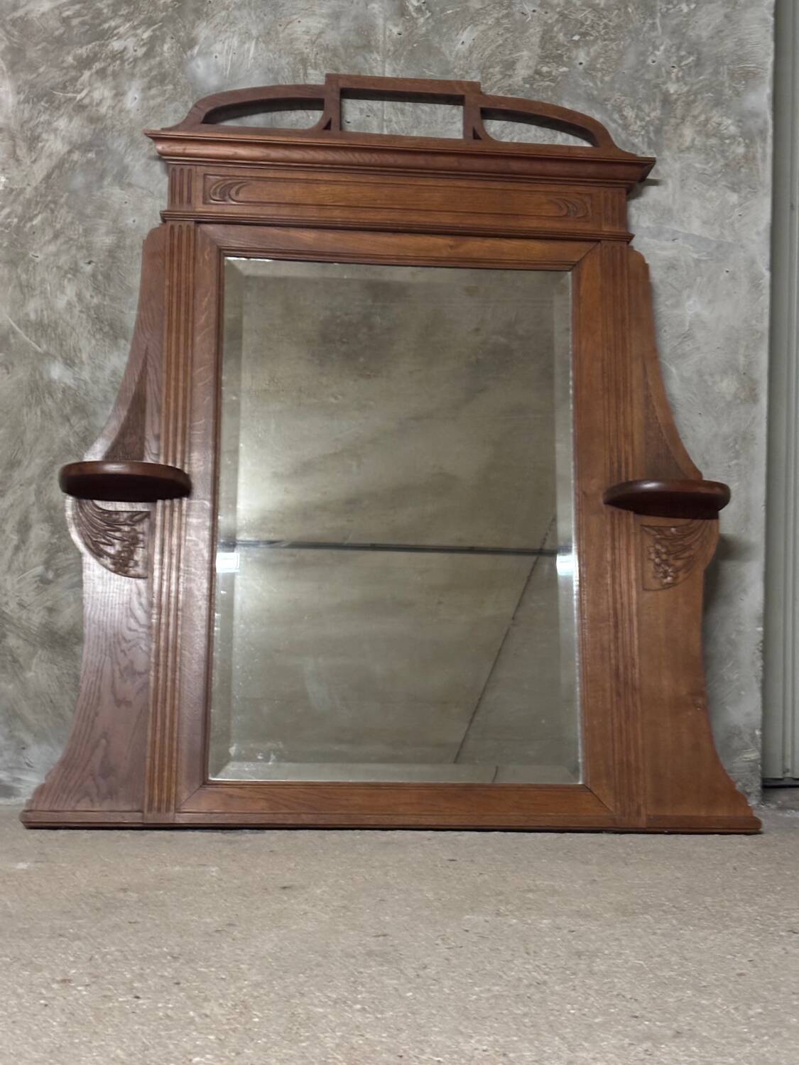 Molded and carved wooden trumeau