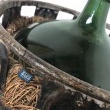 Demijohn of 100 litres with its metal basket