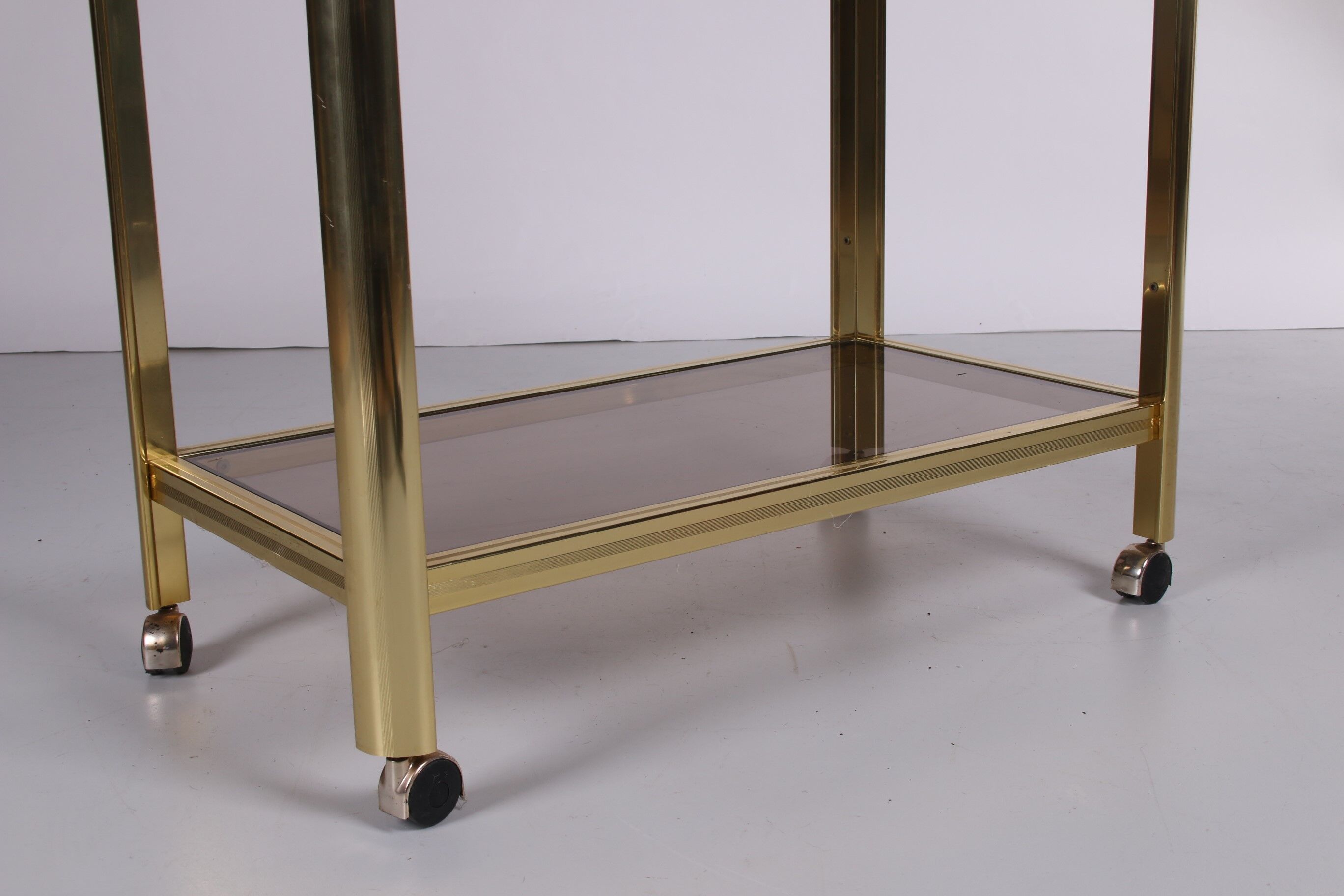 Hollywood Regency trolley with smoked glass