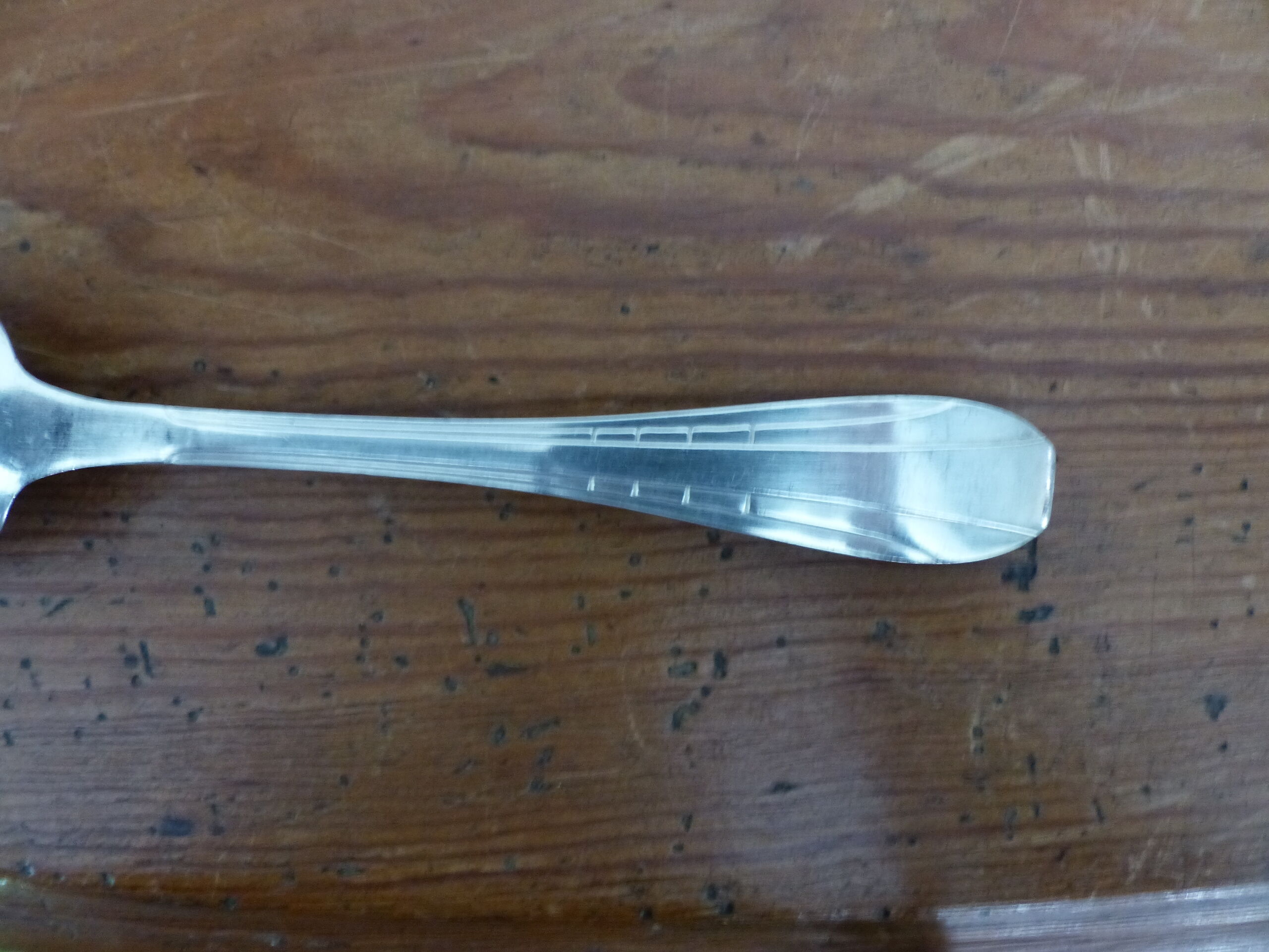 Silver metal housewife 12 cutlery and a ladle