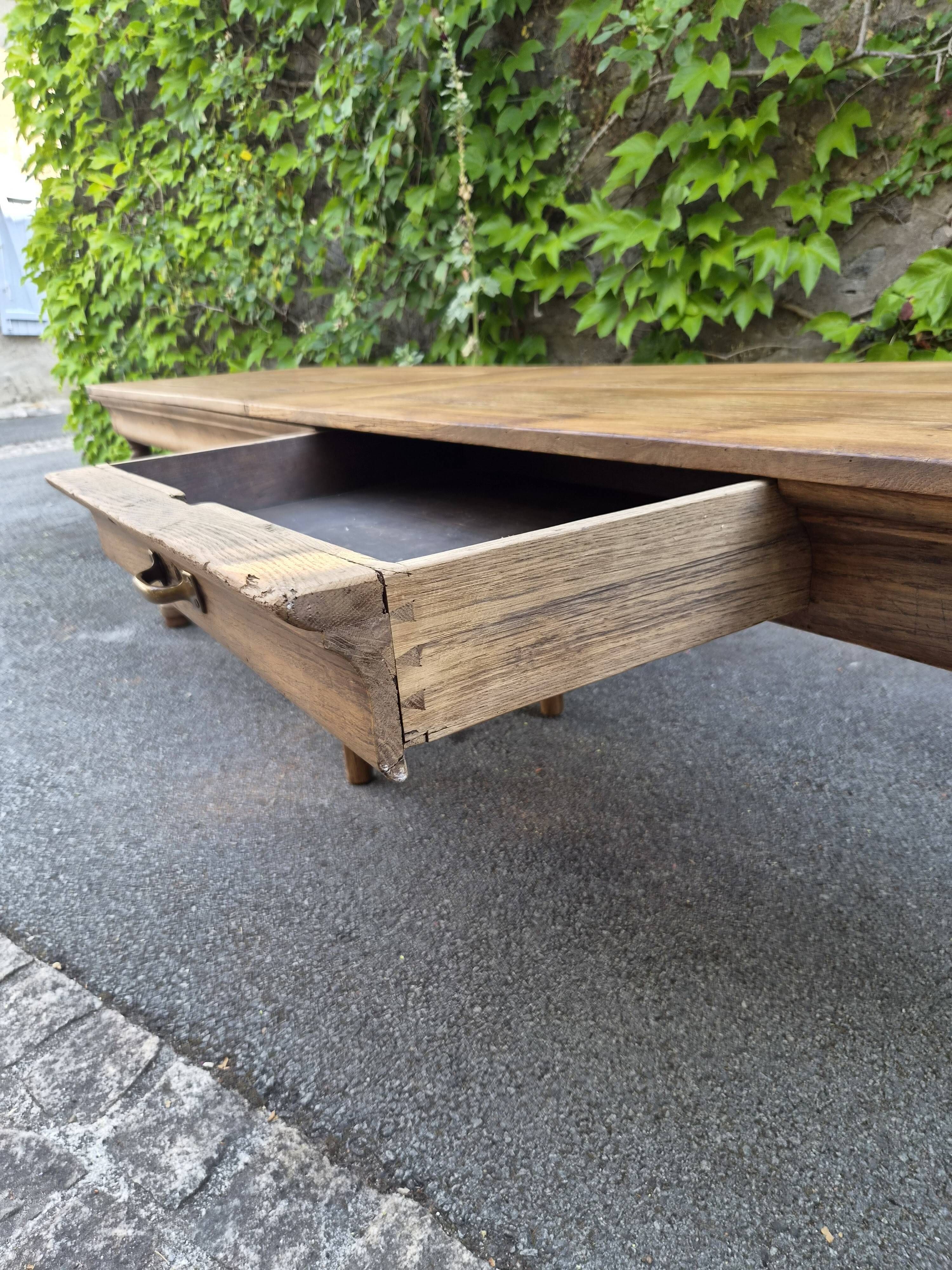 Antique French draper's table in oak, shop counter, work table, 6 feet, circa 1750–1850.