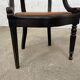 Fauteuil Louis Philippe en bois noir et cuir cognac