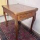 Game table in marquetry in the Louis XV style from the late 19th century.