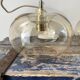 Set of three new electrified golden glass pendant lamps