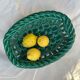 Green woven ceramic basket