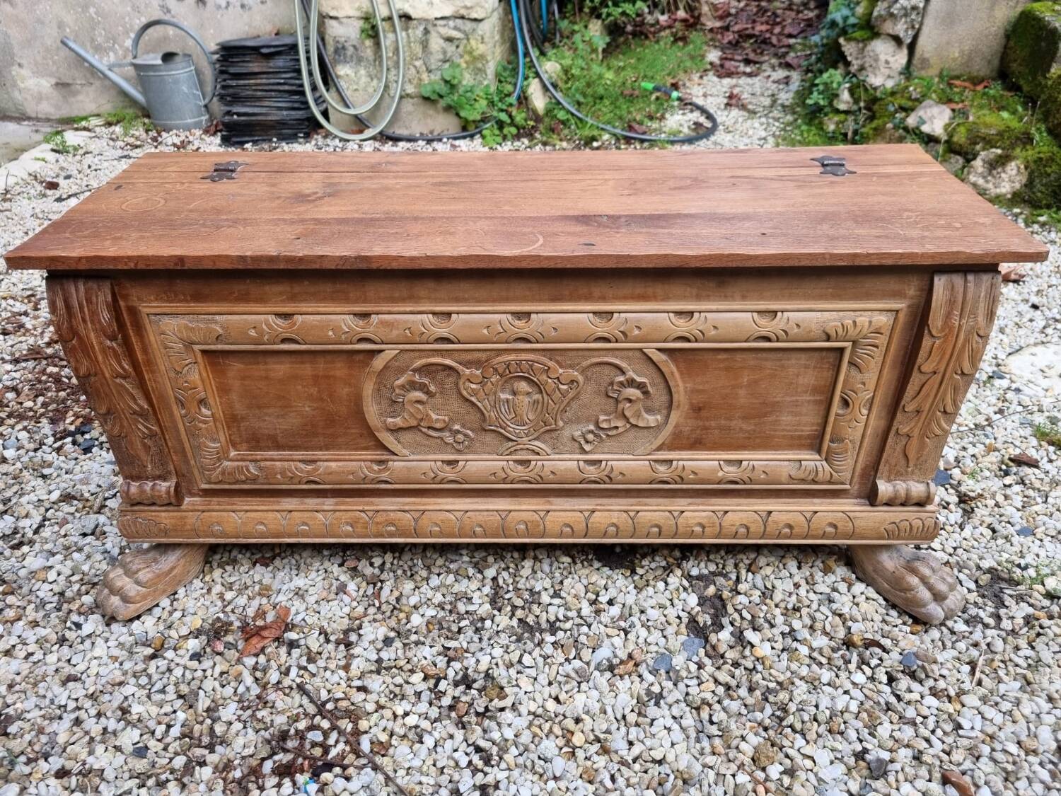 Wooden chest with lion paws