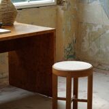 Mid-century Danish stool in oak, reupholstered in boucle wool, circa 1950.
