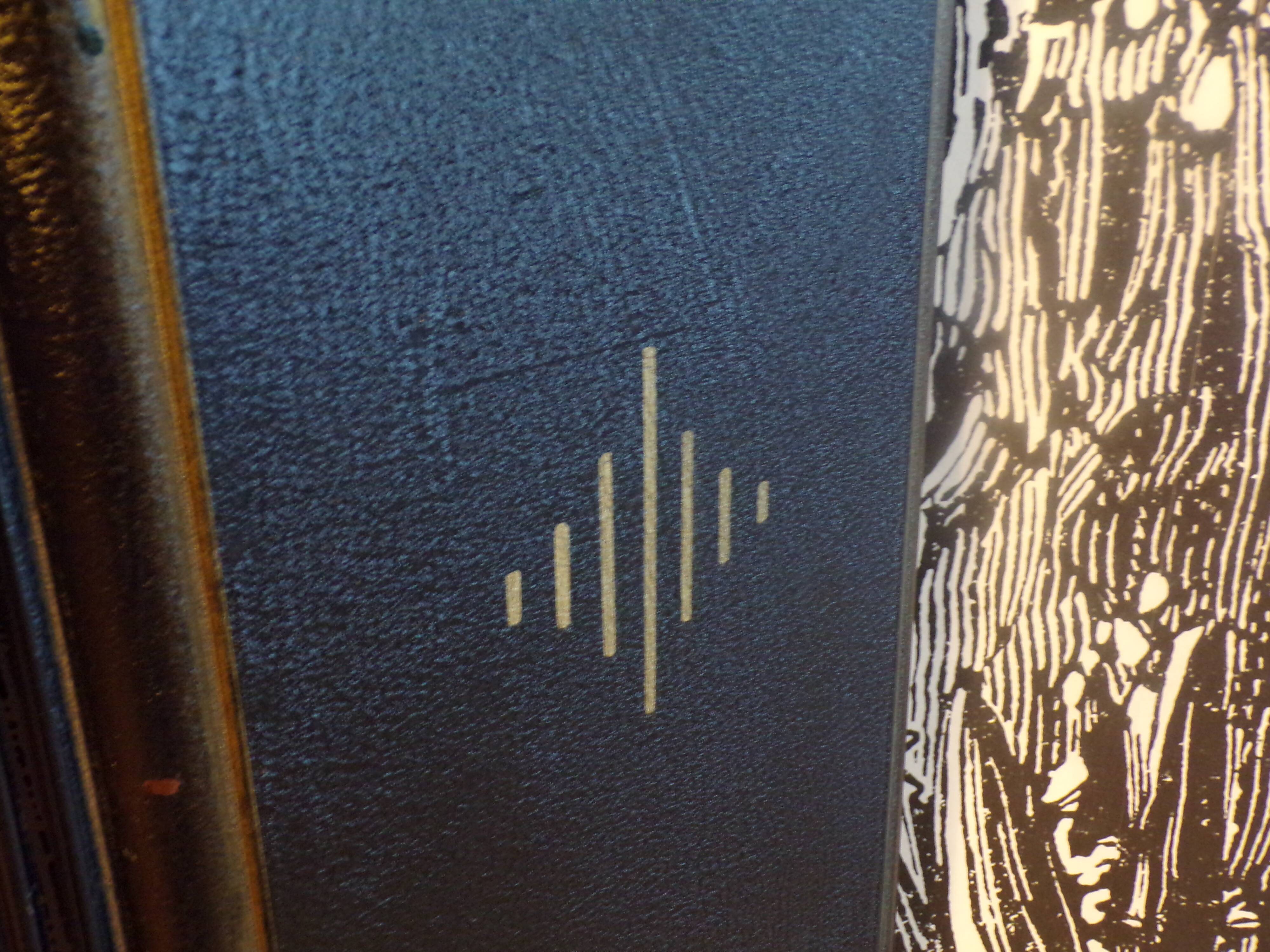 Old fireplace screen in painted sheet metal