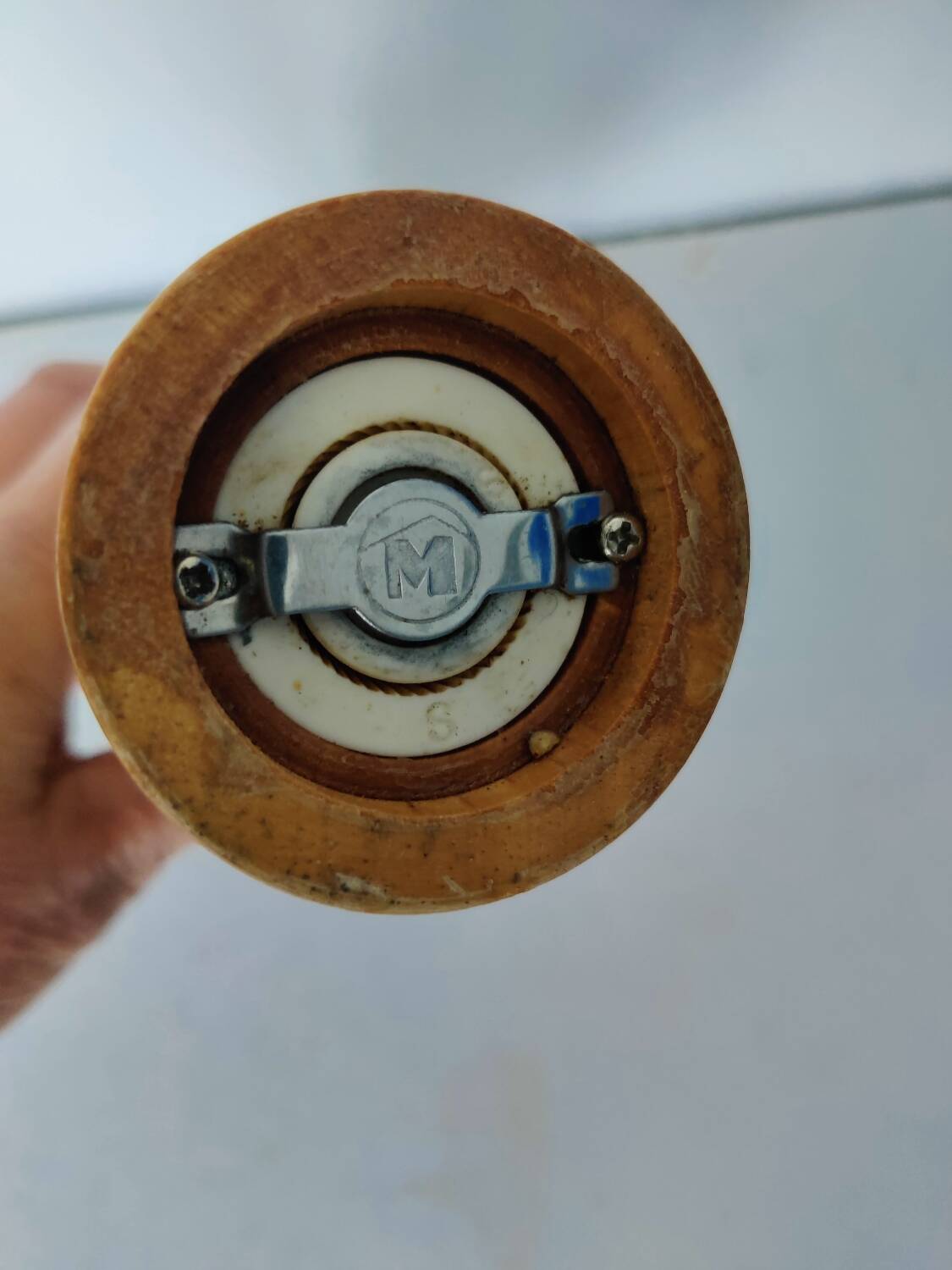 Turned wooden pepper mill